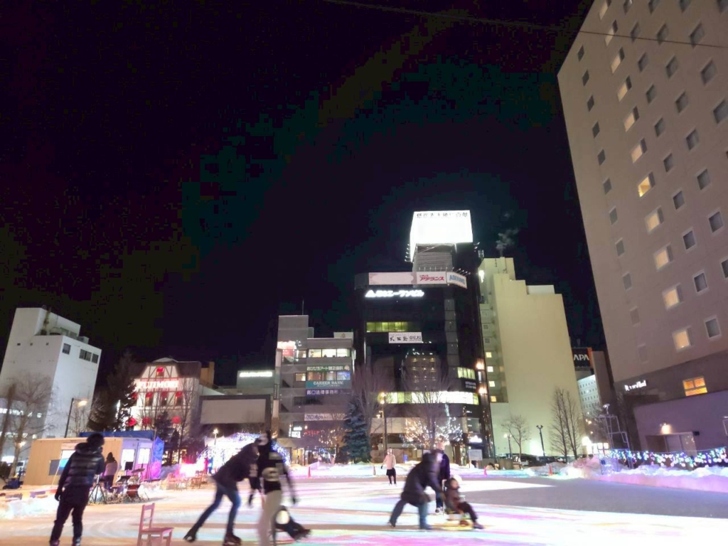 Trying curling on the ice at Tokachi Ice Park Plus